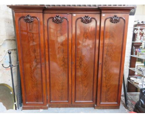 VICTORIAN MAHOGANY INVERTED BREAKFRONT FOUR DOOR WARDROBE WITH FITTED INTERIOR 