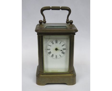 MINIATURE BRASS AND GLASS CARRIAGE CLOCK, APPROXIMATELY 8cm HIGH 