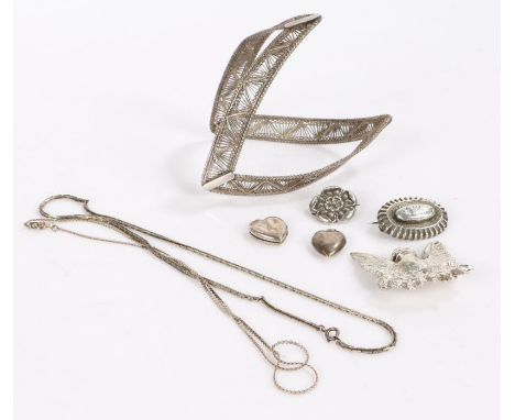 Collection of silver jewellery to include a brooch depicting a eagle, two necklaces and a bangle ect (8)