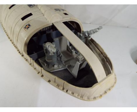 Star Wars - a vintage Star Wars rebel transport ship (unboxed) appears generally in a very good condition (some pealing of de