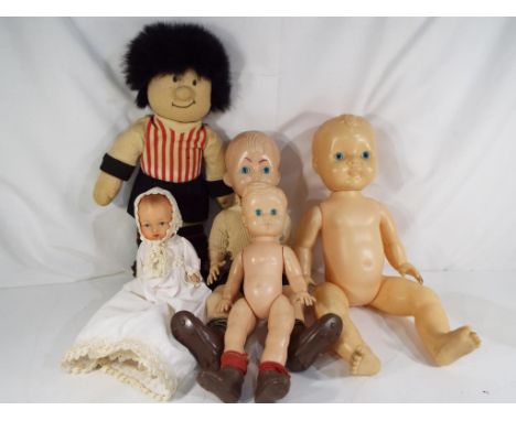 Vintage dolls - five dolls comprising three footballing dolls, a ceramic dressed doll and unnamed, condition vg.