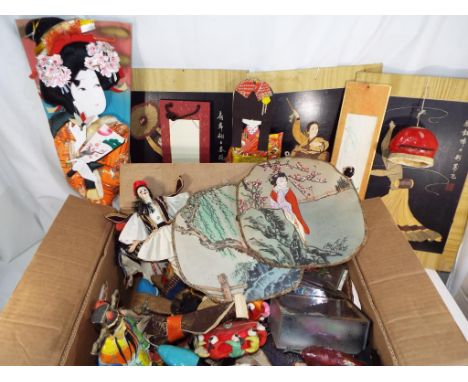 Vintage Asian dolls - in excess of 40 dolls, along with a selection of oriental fans, condition to vg to g. 
