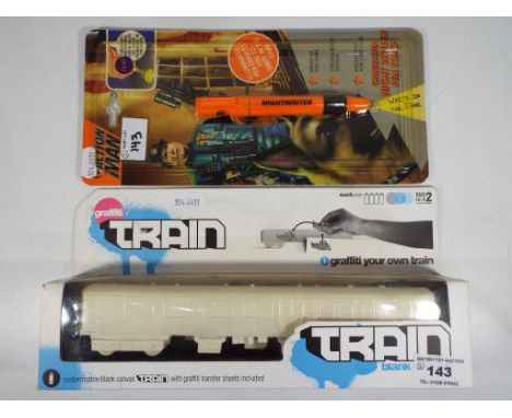 Action Man - A Crime Buster Night Writer pen torch and also Graffiti Train by Suckuk. Items in NM condition in NM boxes.