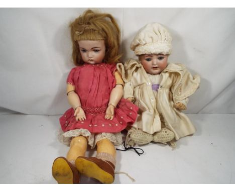 Armand Merseille - Two vintage Bisque headed dolls both with sleeping eyes, jointed limbs, composition bodies and open mouths