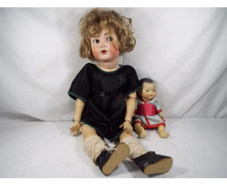 Armand Marseille - Two dolls Bisque headed dolls, nape of necks marked made in Germany 117 n and 2 / ok. Larger doll features