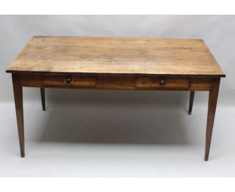 A 19TH CENTURY PROBABLE FRENCH OAK RECTANGULAR PLANK TOPPED FARMHOUSE KITCHEN TABLE having two inline cutlery drawers, suppor