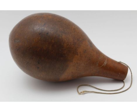 A 19TH CENTURY GOURD FLASK considered to be Pacific Islands, engraved fish decoration, 24cm high 