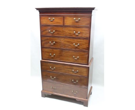 A 19TH CENTURY MAHOGANY CHEST ON CHEST the upper section having dented cornice over two inline &amp; three graduating full wi