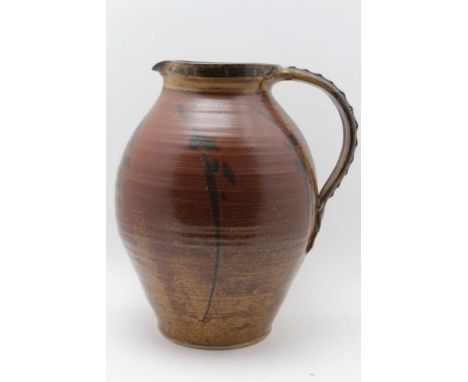 MICHAEL LEACH (1913-1985), A STUDIO POTTERY STONEWARE JUG with strap handle, brushwork decoration, impressed marks to LM and 