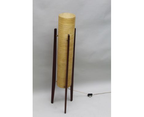 A RETRO DESIGNED ROCKET FLOOR LAMP having textured fibreglass cylindrical shade, supported on three teak finished fins, stand