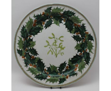 A 19TH CENTURY COPELAND CERAMIC CHRISTMAS PLATE, painted with a holly border around a central sprig of mistletoe, impressed, 