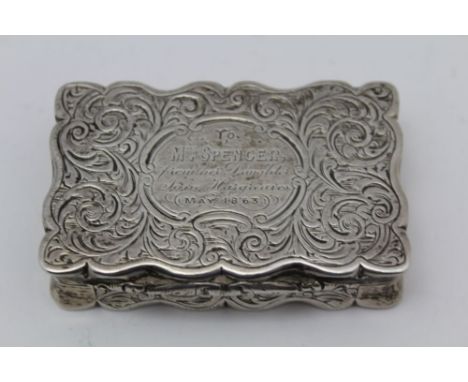 NEILL &amp; COOK A silver snuff box, serpentine form with hinged cover, acanthus leaf engraved, Birmingham 1860, inscribed, g