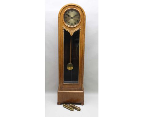 A PROBABLE CONTINENTAL ART DECO DESIGN LIGHT OAK FREESTANDING LONGCASE CLOCK with plain brass dial, the bevelled glass door r