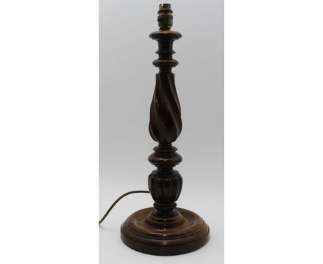 A PROBABLE FIRST QUARTER 20TH CENTURY TURNED ROSEWOOD TABLE LAMP, 44cm high (excluding fitting) 