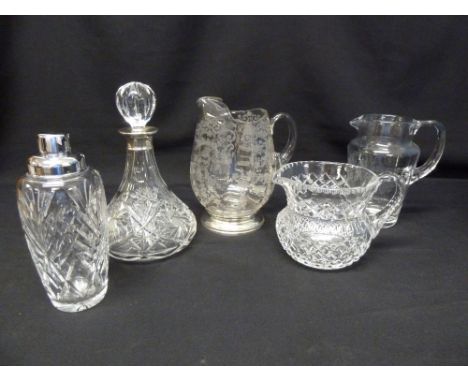 A quantity of fine crystal and cut glass to include a decanter with silver collar and a cocktail shaker (5)