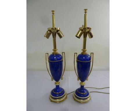 A pair of Russian style simulated lapis lazuli lamp stands with gilt metal mounts