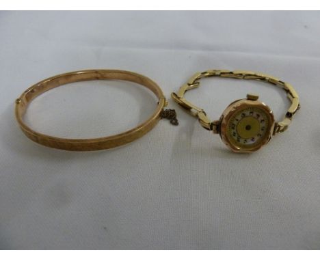 9ct gold bangle and a 9ct gold ladies wristwatch