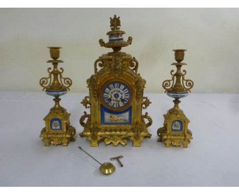 French gilt metal mantle clock set with Sevres style panels and dial to include pendulum and key