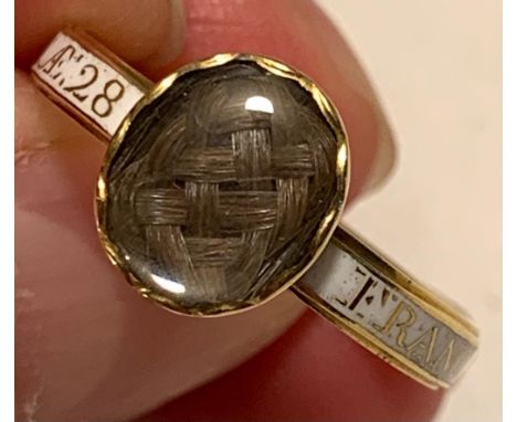 IN MEMORIAM YELLOW METAL RING SET WITH WHITE ENAMEL AND PLAITED HAIR, FRANCES STROTHER OB, 7th APRIL 1770 AGE 28, SIZE R, TOT