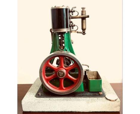 STUART TURNER STATIC MODEL STEAM ENGINE. APPROX. 22CM H X 20.5CM w x 13CM D (INCLUDING BASE)

USED CONDITION, NOT TESTED FOR 
