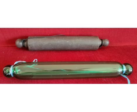 GREEN GLASS ROLLING PIN, PLUS ONE OTHER ROLLING PIN

Both in used condition, unchecked 