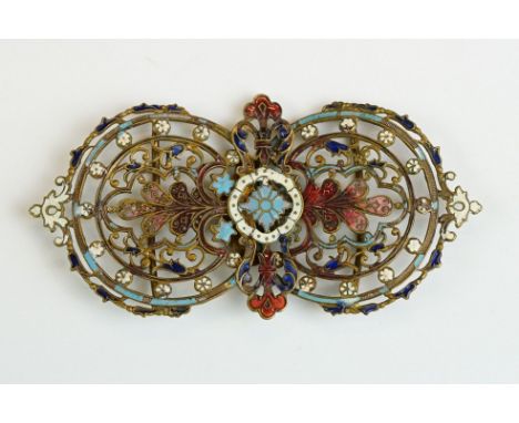 An ornate brass two piece belt buckle with enamel decoration. 