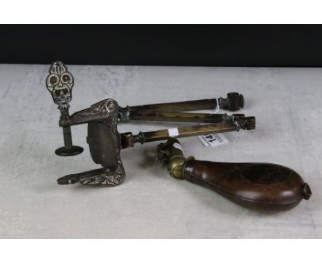 19th Century leather gun powder flask with hunting scene and hinged brass top, 21cm long, together with a 19th century brass 