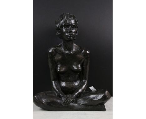 Bronzed resin model of a nude female seated in a cross-legged position, in the manner of Tom Greenshields, measures approx 36