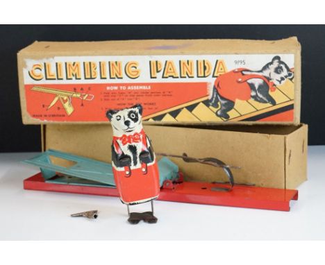 A vintage Climbing Panda tin plate toy in original box. 