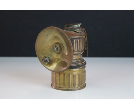 An antique brass 'Victor' carbide bicycle lamp. 