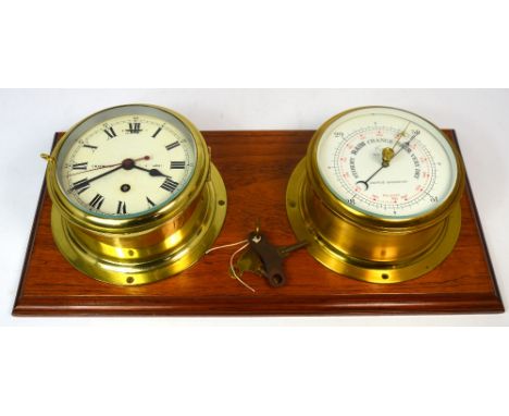 A brass ship's clock with circular dial inscribed 'Chadburn Liverpool' and a Cope of Nottingham aneroid brass-cased ship's ba