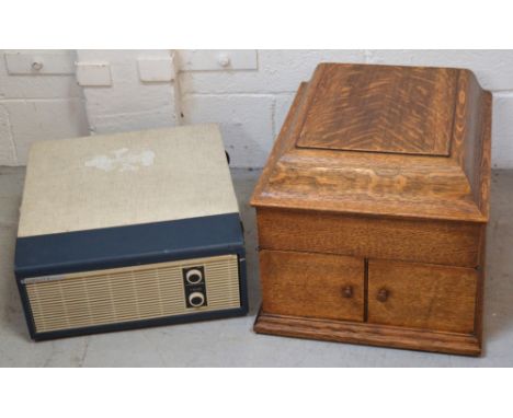 A vintage Fidelity Solid State portable record player and a light oak cased HMV gramophone (2).