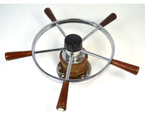 A vintage five-spoke yacht wheel with bracket attachments, diameter approx 40cm.