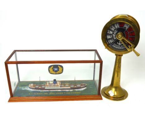 A scratch-built scale model ship in glazed display case, the case with gilt lettering to the front 'M V Memnon 1968, John Goo