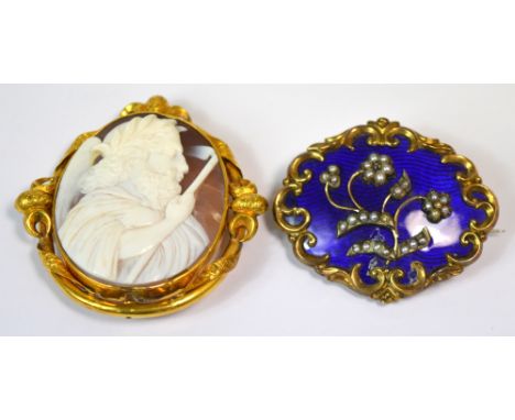A 19th century cameo of a classical image set in a yellow metal scrolling ornate mount (af) and a Victorian yellow metal and 