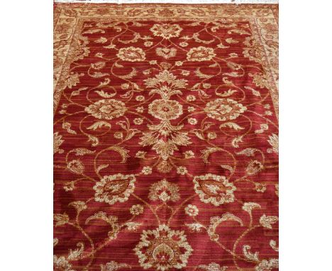 A red ground Zeigler style carpet, 230 x 160cm.