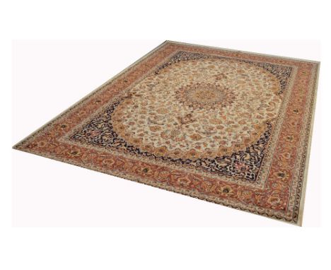 A beige ground Keshan style carpet, 280 x 200cm.
