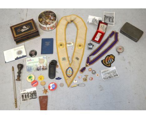A collector's lot comprising Masonic memorabilia to include a purple sash with 9ct yellow gold mounts, medals and badges, coi