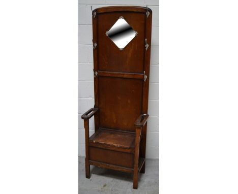 A mid 20th century oak hall stand and an oak stick and umbrella stand (2).