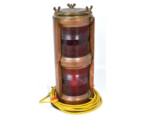 A seahorse copper ship's port lamp impressed no.87033, converted to electricity, height 50cm.