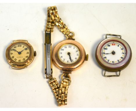 A ladies' 9ct gold cased wristwatch, circular enamel dial set with Arabic numerals, a further ladies' 9ct gold wristwatch and