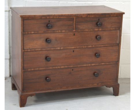 A Victorian mahogany two-over-three chest of drawers on bracket feet, width 112cm