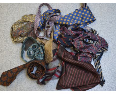 A collection of vintage designer ties to include Yves Saint Laurent, Christian Dior, Pierre Cardin, Lanvin, Gieves & Hawkes, 