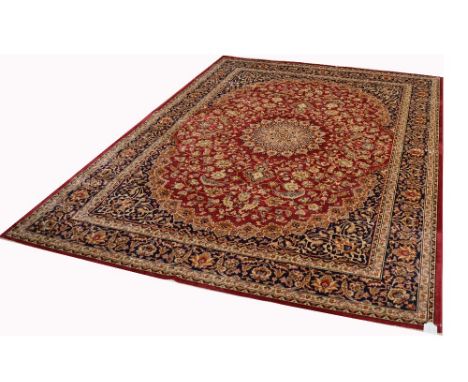 A red ground Keshan style carpet, 280 x 200cm.