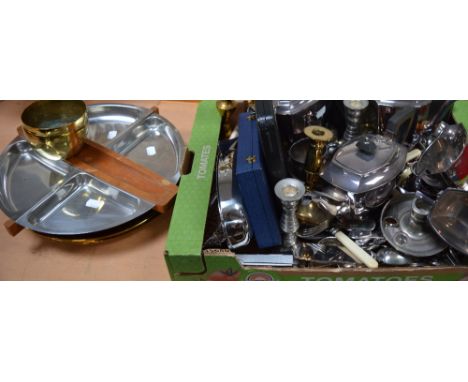 A quantity of metalware to include brass candlesticks, plated tea service, plated flatware etc.