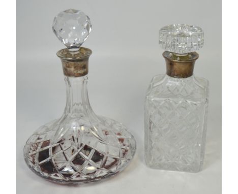 A contemporary cut glass ship's decanter with hallmarked silver collar, height 27cm and a further square sectioned decanter w