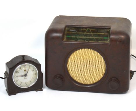 A vintage Bakelite Bush radio type D.A.C.90A serial number 73/158788 and a similar Smith Sectric Bakelite alarm clock (2).