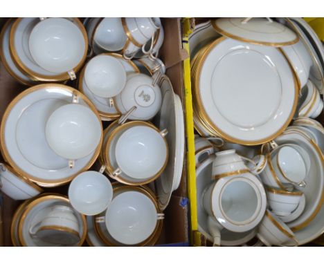 A Noritake 'Goldridge' dinner and tea service, each piece decorated with gold bands on a white ground, pattern no.5480S.