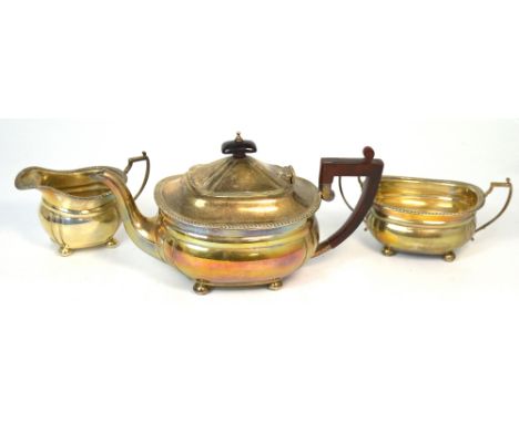 An Elizabeth II hallmarked silver three piece tea service comprising teapot, milk jug and sugar basin, all Birmingham 1967, a