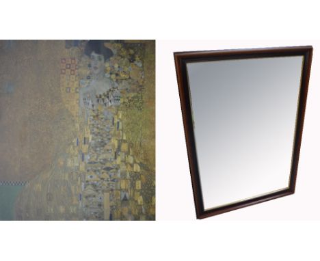 A contemporary bevelled edged wall mirror, width 59cm and a modern decorative print of a lady, framed and glazed (2).